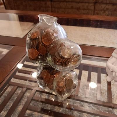 GLASS SNOOPY BANK FULL OF PENNIES