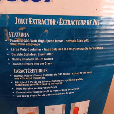 NEW OSTER JUICE EXTRACTOR