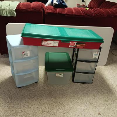 TWO 3 DRAWER ORGANIZERS AND 2 STORAGE TOTES