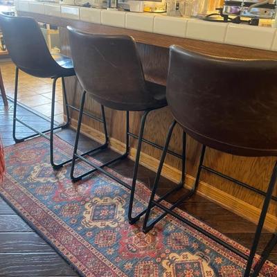 Bar stools leather and rug 
