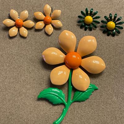 Metal flower brooch with clip ons