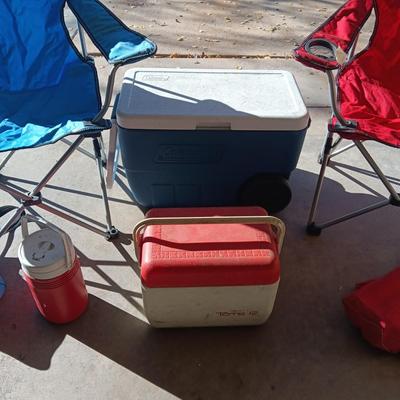 2 FOLDING CHAIRS, COLEMAN COOLER ON WHEELS, BEVERAGE AND SMALLER COOLER