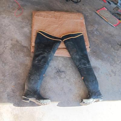 CABELA'S FISHING WADERS AND A TAN TARP