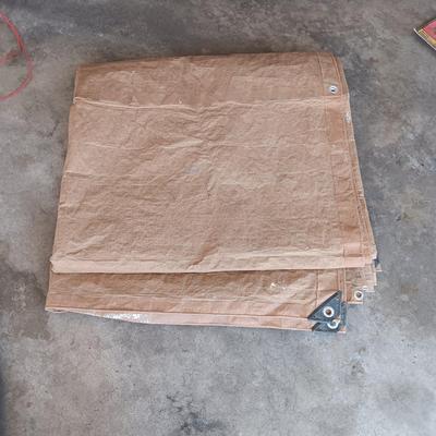 CABELA'S FISHING WADERS AND A TAN TARP