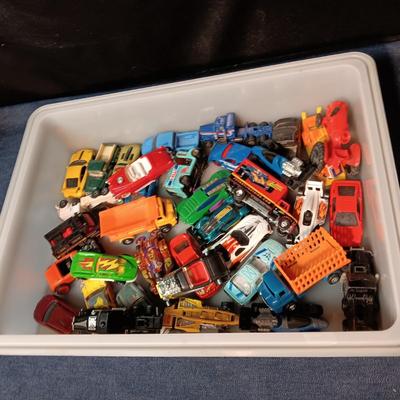 AN ASSORTMENT OF TOY CARS
