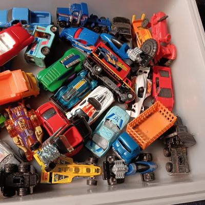 AN ASSORTMENT OF TOY CARS