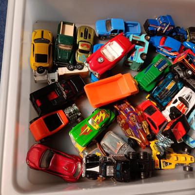 AN ASSORTMENT OF TOY CARS