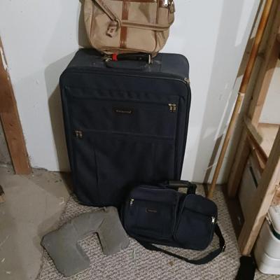 SUITCASE, NECK PILLOW AND CARRY ON BAGS