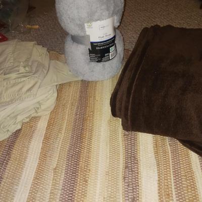THROW RUG AND 2 THROW BLANKETS PLUS A SET OF QUEEN SHEETS