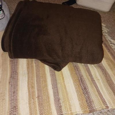 THROW RUG AND 2 THROW BLANKETS PLUS A SET OF QUEEN SHEETS