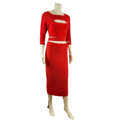 Sale Photo Thumbnail #426: Stunning two-piece red ribbed knit skirt set featuring a top with cutout details and matching midi skirt. Perfect for a bold, stylish look.
Size: Large
Condition: Pre-owned, excellent condition with minimal signs of wear.
Additional Details: Ribbed textur