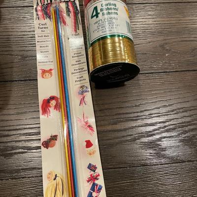 Multiple told of curing ribbon and Curlers tool
