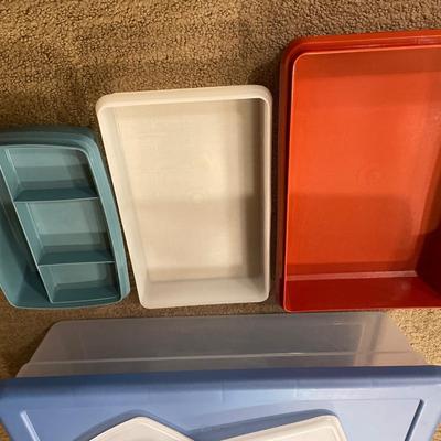 3 Tupperware containers and small storage tote