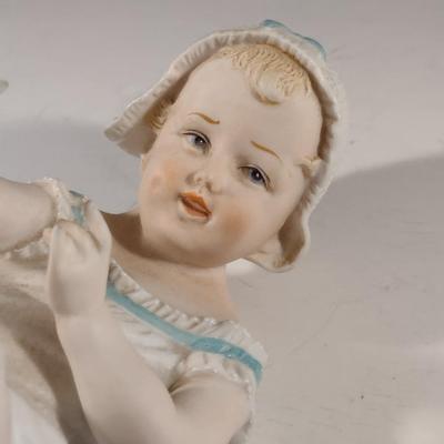 Porcelain Child Figurine