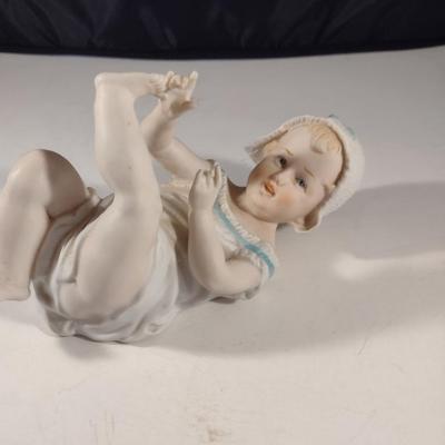 Porcelain Child Figurine