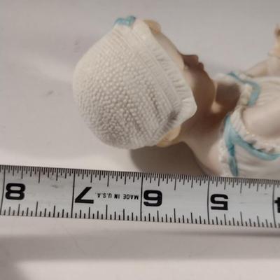 Porcelain Child Figurine