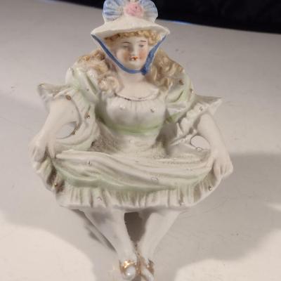 Naughty Porcelain Shelf Sitter