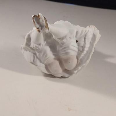 Naughty Porcelain Shelf Sitter