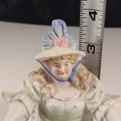 Naughty Porcelain Shelf Sitter