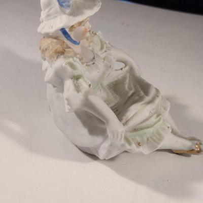 Naughty Porcelain Shelf Sitter