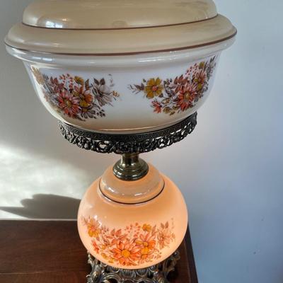 Vintage hurricane lamp with orange and yellow flowers