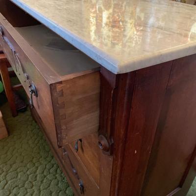 Wood dresser with marble top
