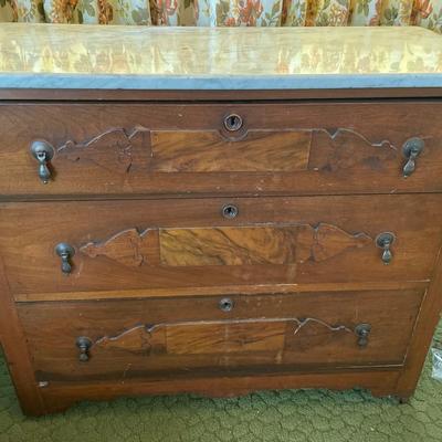 Wood dresser with marble top