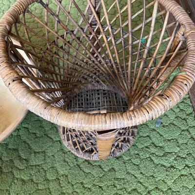 Wicker base with large wood bowl on top