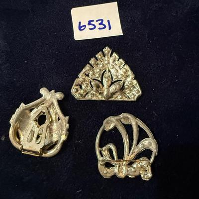Broaches without backs