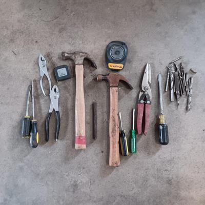 A FEW DRILL BITS AND HAND TOOLS