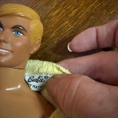 Ken in a yellow robe