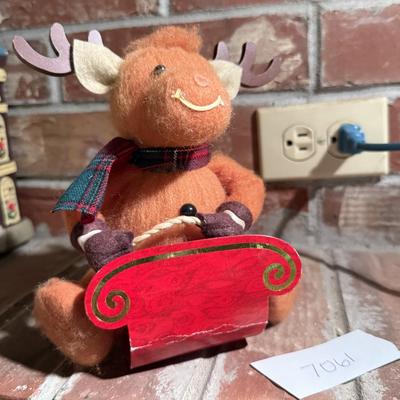 Reindeer on a cardboard sled