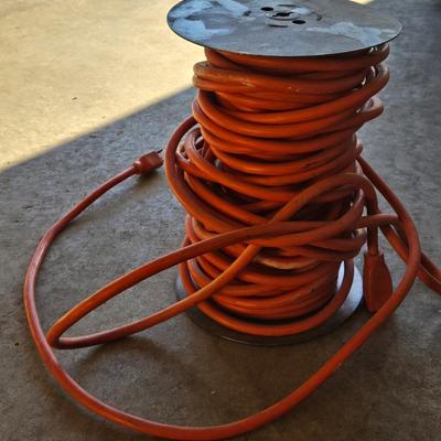 Spool of Orange Extension Cord