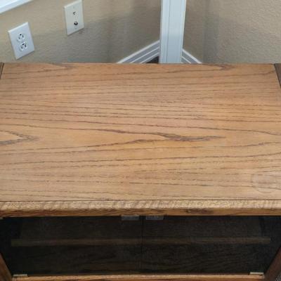 Television Stand with Pull Out Shelf and Glass Doors