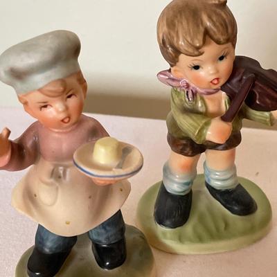 Children figurines from different makers