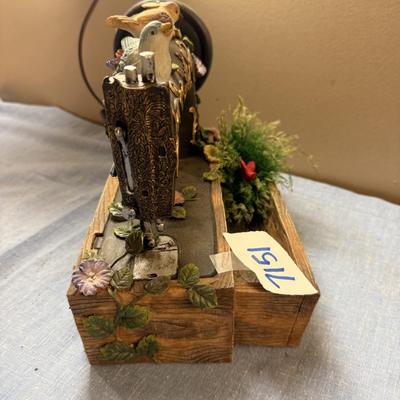 Birds on sewing machine