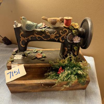 Birds on sewing machine
