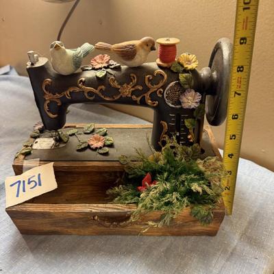 Birds on sewing machine