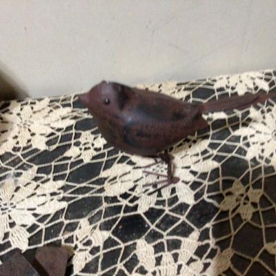 Cast Iron Lady Door Stop, Metal Bird, and Oxen Hoof Shoes.