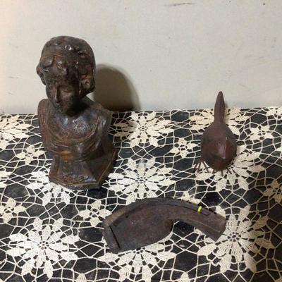 Cast Iron Lady Door Stop, Metal Bird, and Oxen Hoof Shoes.