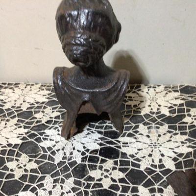 Cast Iron Lady Door Stop, Metal Bird, and Oxen Hoof Shoes.