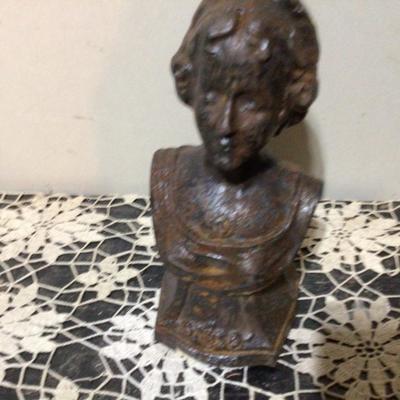 Cast Iron Lady Door Stop, Metal Bird, and Oxen Hoof Shoes.