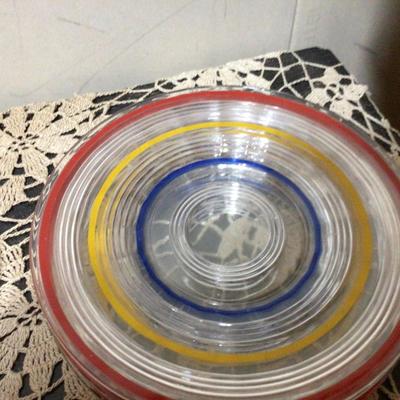 Red, Yellow, Blue Striped on Clear Glass Plates