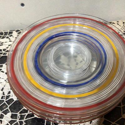 Red, Yellow, Blue Striped on Clear Glass Plates