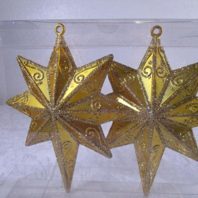2 gold star hanging decorations