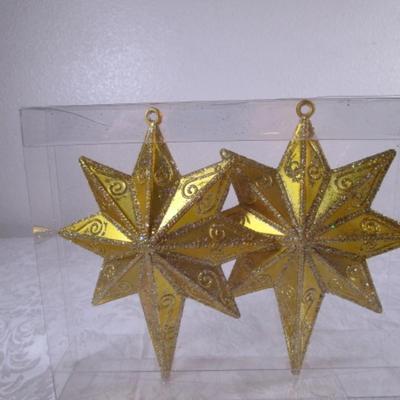 2 gold star hanging decorations