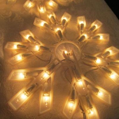 String of 9 lighted snowflakes
