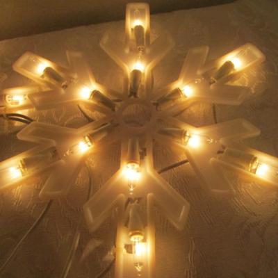 String of 9 lighted snowflakes