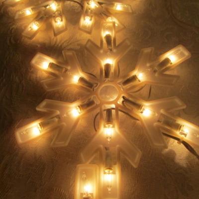 String of 9 lighted snowflakes