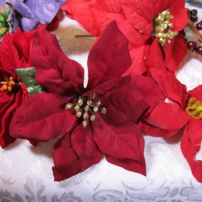 Poinsettias & berries, & shiny blue beaded bush for décor